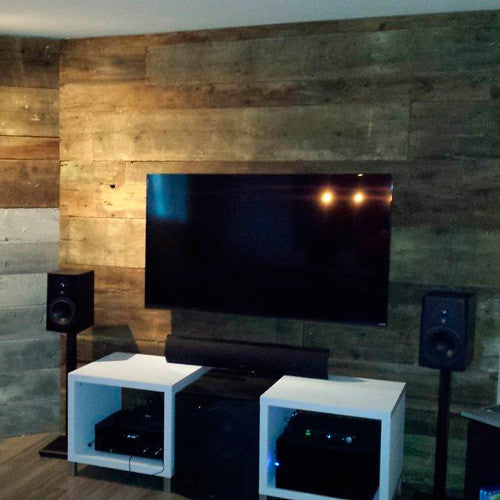 Reclaimed Wood Paneling Frames Stunning Surround Sound System in Canada