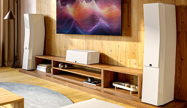Modern home entertainment system with SVS Ultra Evolution speakers and a TV in a living room.